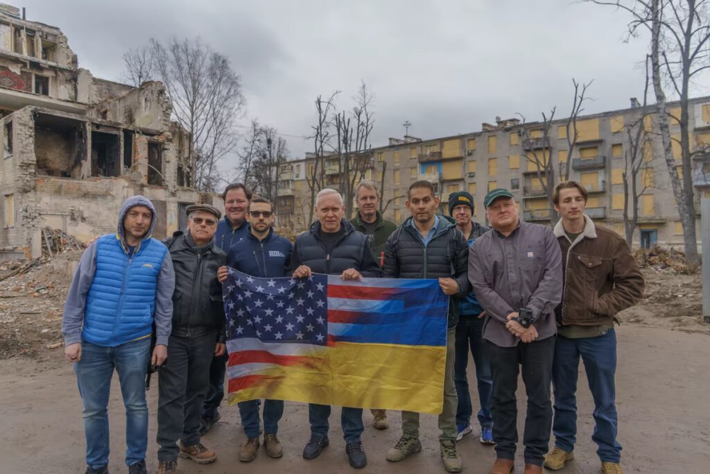 RDI delegation with US and Ukrainian flags