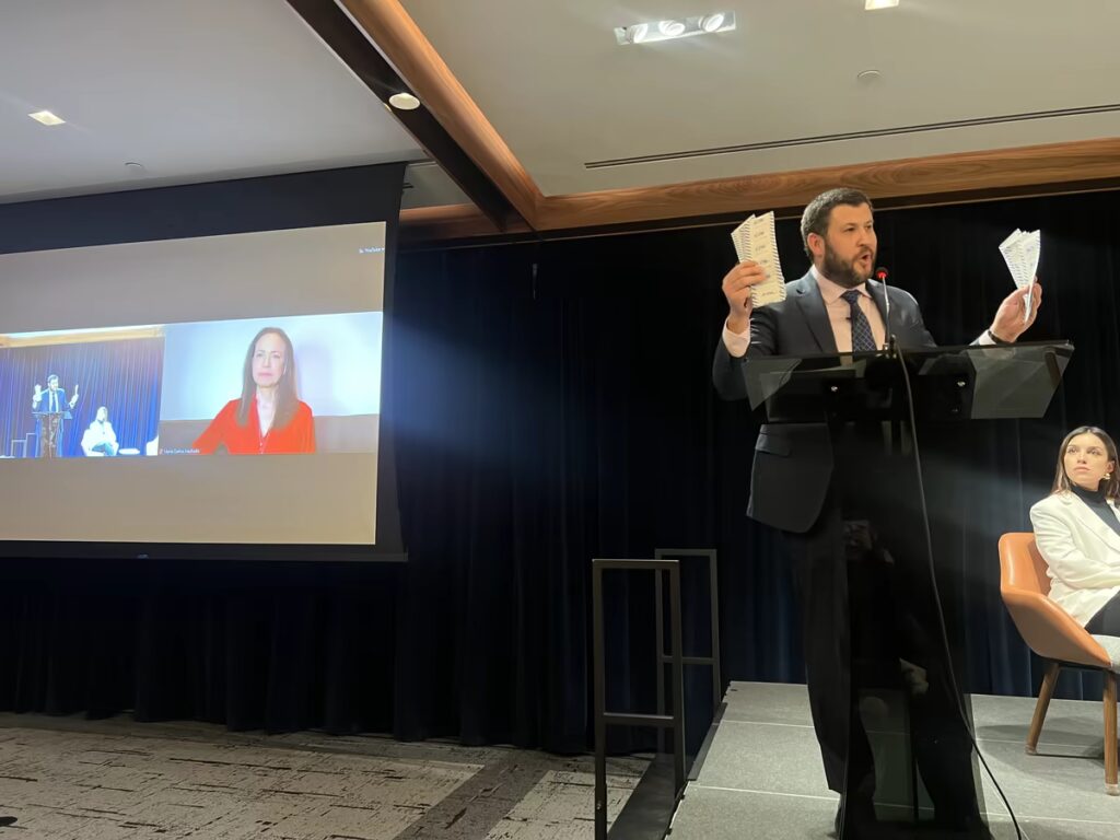 Talk on stage at an RDI event